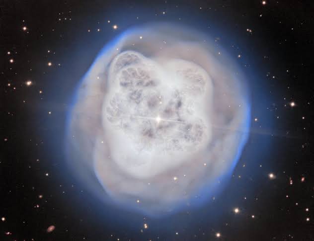 Dazzling image of the Crystal Ball Nebula shows a dying star in a binary system