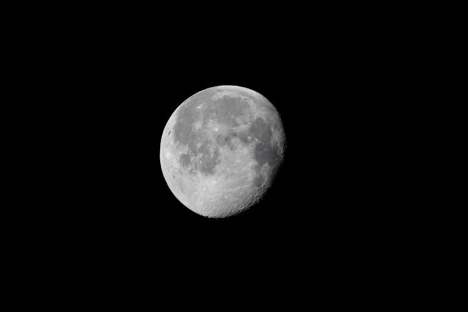 The moon is drifting away from Earth by about 3.8 centimetres a year — measured to the millimetre by bouncing laser light off mirrors the Apollo astronauts left sitting in the lunar dust more than half a century ago