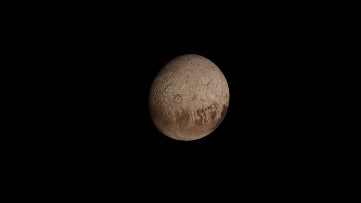 The James Webb Space Telescope has detected the same unexplained absorption signal on the surfaces of Pluto and Titan — two frozen worlds with very different environments but methane-and-nitrogen chemistry in common — and so far, scientists cannot