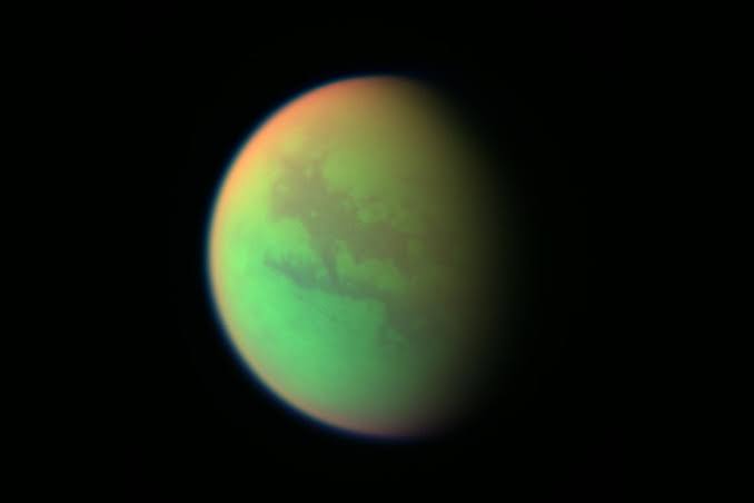 Both Pluto and Titan Share a Mystery Molecule That’s Never Been Seen Before