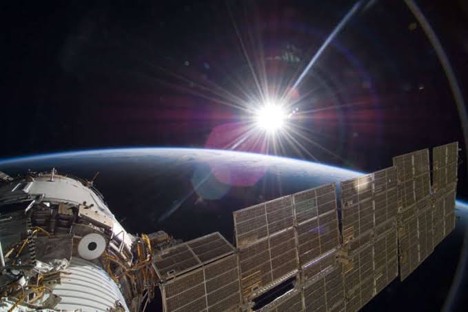 Astronauts on the Moon, with no atmosphere above them, looked up and saw a white sun — the yellow colour we see from Earth is not the sun's real colour but an artefact our own atmosphere paints onto it by scattering blue wavelengths sideways into the sky
