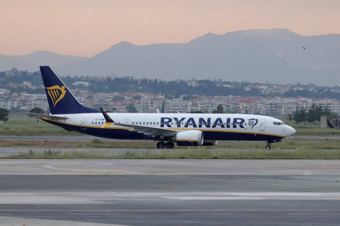 Man partly sucked out of broken window on flight from Greece was pulled back by passengers