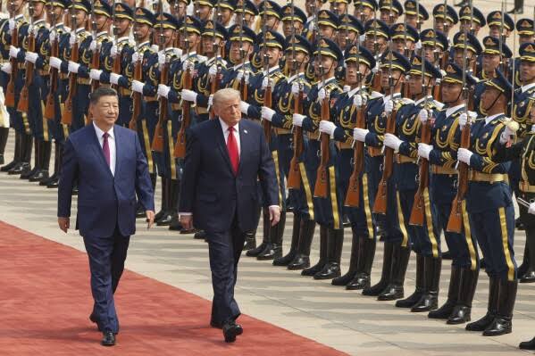 Brass bands in Beijing make way for sticker shock at home as Trump returns to escalating inflation