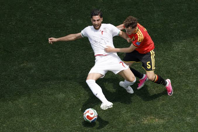 Iran’s beleaguered World Cup team finds hope with draw against Belgium