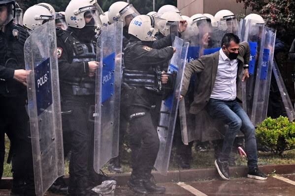 Turkish police storm offices of the main opposition CHP party, firing tear gas and rubber bullets