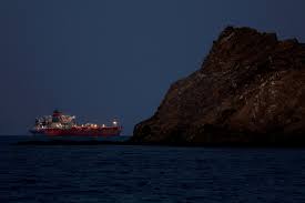 Hormuz at near standstill as Iran warns ships to keep to its waters