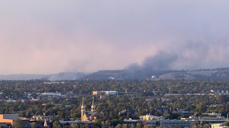Thousands still evacuated from their homes as the Old Trails Fire burns in northwest Spokane
