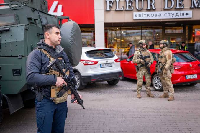 A mass shooting in Ukraine's capital leaves 6 dead before police shot and killed the gunman