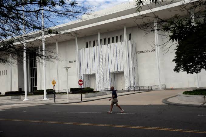 Kennedy Center exterior remains covered after Trump’s name is removed