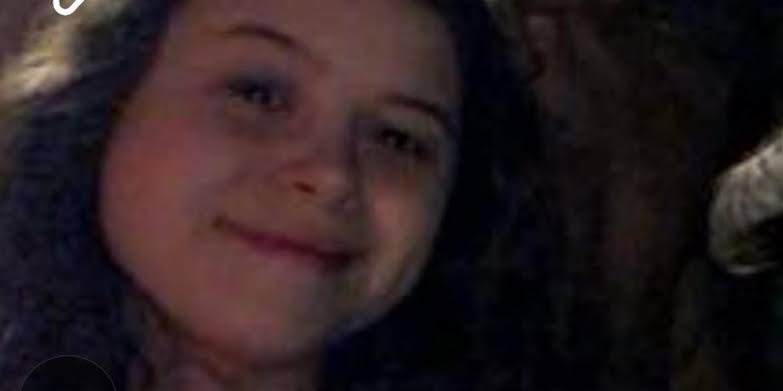Woman swept in flash flooding found dead